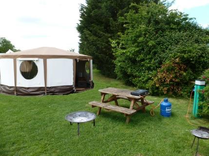 A modern glamping Yurt at Dorset Country Holidays
